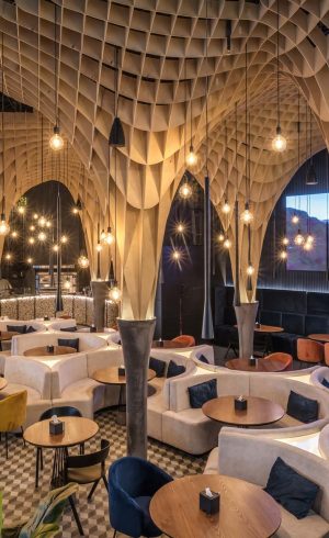 MINSK, BELARUS -  MAY 2018: designer ceiling in banquet hall  with appliances in an elite luxury restaurant with intimate lighting